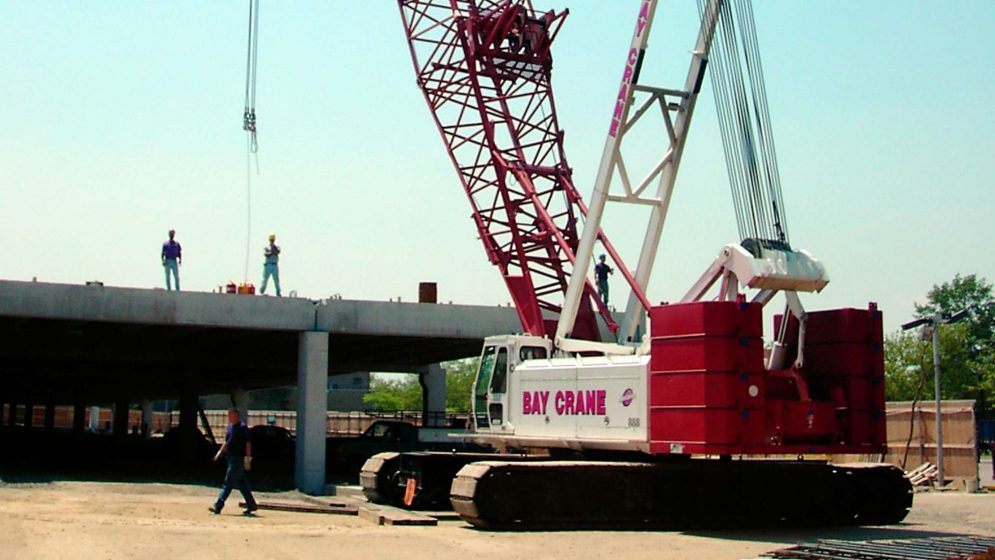 888 crawler crane on site with Bay Crane employees