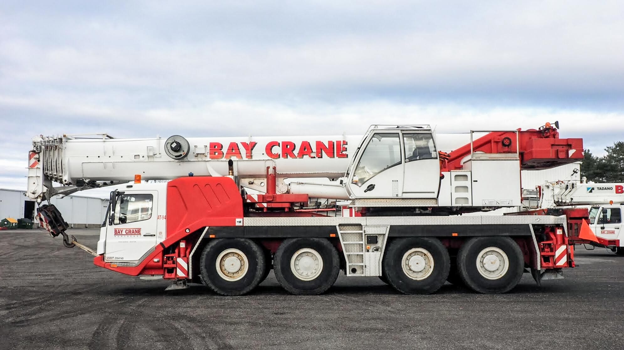 GMK 4115 all terrain crane with a hydraulic expandable