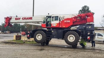 Rail mounted crane with Bay Crane employees