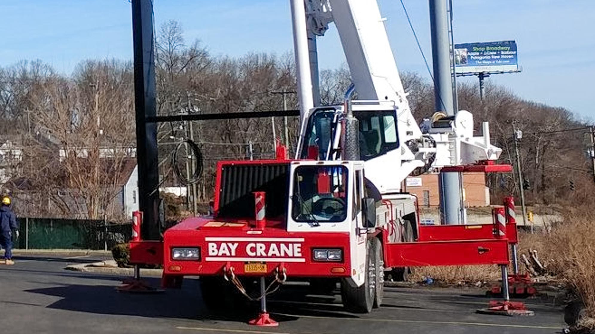 HTC 8660 truck crane mounted on a truck chassis